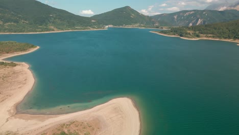 Beautiful-Panoramic-View-Of-Campotosto-Lake-In-Italy---aerial-shot