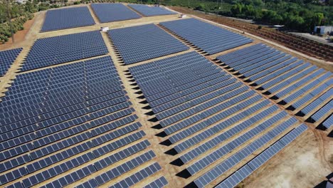 Solar-Power-Plant-and-Olive-Farming-Fields-in-Countryside-of-Spain,-Drone-Aerial-View