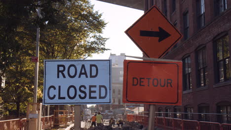 Road-closed-and-Detour-signs-in-streets-of-New-York-City,-close-up