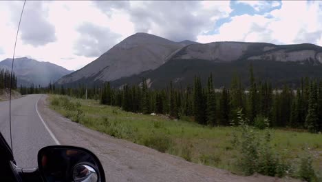 Passenger-window-view-of-northern-Rocky-Mountains-along-the-Alaska-Highway