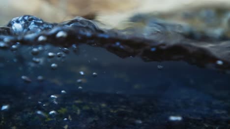 Slow-motion-video-of-water-waves-with-splashes-and-falling-drops
