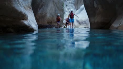 Tourists-are-enjoying-body-rafting-in-mountain-River-Flowing-Through-A-Canyon
