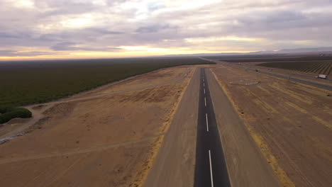 Small-airplane-landing-strip-in-Central-California-next-to-Highway-5-near-Coalinga