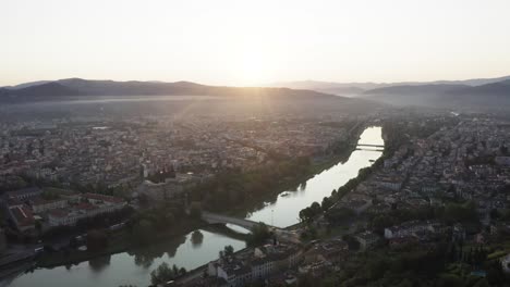 Aerial-View-Of-Sunrise-Over-Florence,-Italy