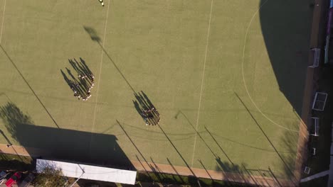 Overhead-Shot-Of-Two-Hockey-Teams-Preparing-Match,-Buenos-Aires-Club,-Argentina