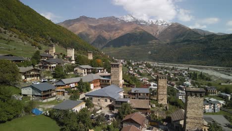 Residential-and-Caucasus-mountain-in-background,-Svaneti-city,-Georgia