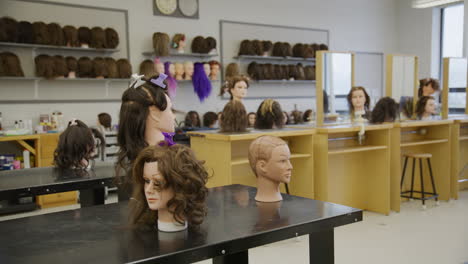 Establishing-shot-of-a-hairdressing-class-in-a-trade-school