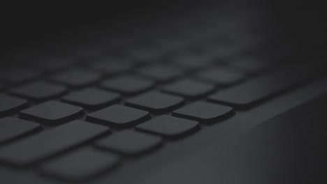 Black-keyboard-in-a-close-up-with-a-focus-pull