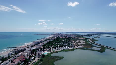 Aerial-panorama-view-La-Grande-Motte-with-coastline-and-blue-sky-in-summer,France