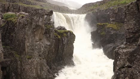 Dangerous-Nykurhylsfoss-waterfall-in-Fossardalur,-Iceland-in-flood-season