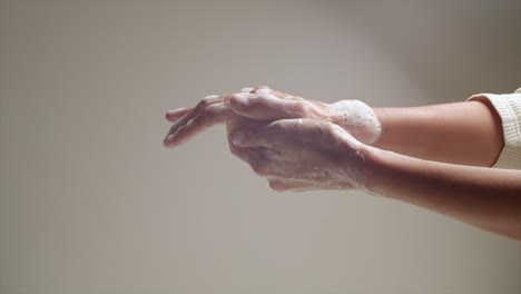 Person-Washing-His-Hands-Carefully-With-Soap,-Personal-Hygiene