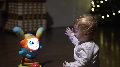 Baby-girl-playing-with-her-new-toy-in-the-living-room-4K