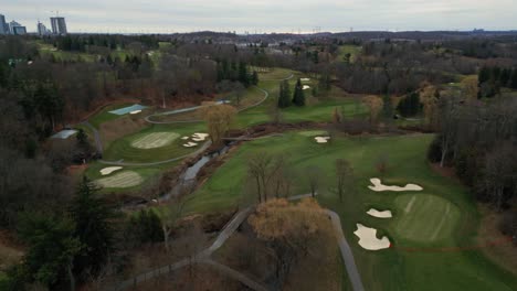 Drone-aerial-flying-above-an-empty-golf-course-in-Richmondhill,-Toronto,-Ontario,-Canada
