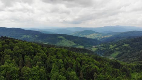 Scenic-mountain-forest-landscape-of-Beskid-Sadecki,-Poland,-aerial-panorama