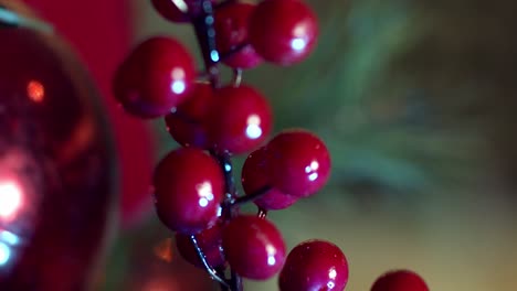 Close-up-revealing-the-Christmas-decoration-of-plastic-red-berries