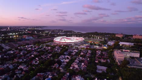 River-Plate-Soccer-Stadium-Monumental-Buenos-Aires-Argentina-Sky-at-Dusk-Aerial-Drone-Fly-Above-Belgrano-Neighborhood
