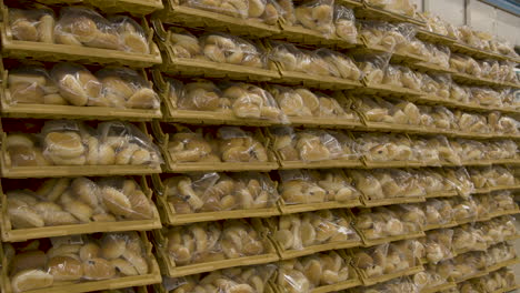 A-wall-of-bread-buns-in-plastic-sacks