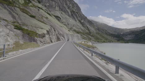 Driving-from-the-Grimsel-to-the-Furka-pass-through-the-famous-valley-in-the-swiss-alps