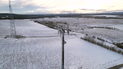 A-360-degree-orbit-aerial-drone-shot-in-the-countryside-during-winter