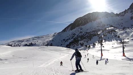 A-skier-carving-down-a-slope-in-the-mountains-of-Andorra