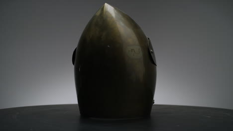 close-up-of-bronze-knight-helmet