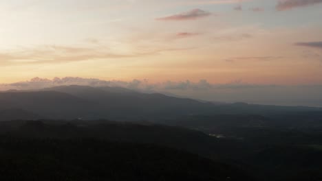 Magical-aerial-landscape-drone-shot-at-sunset,-sunrise