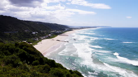 Scenic-Wilderness-beach-with-rolling-waves---panoramic-aerial-view,-Garden-Route