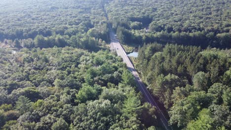 birds-eye-view-to-a-rural-Pennsylvania-road-in-a-forest