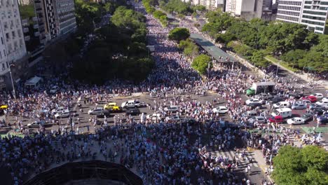 drone-footage-of-the-huge-crowd-of-people-celebrating-argentina's-victory-in-the-world-soccer-championship-in-the-streets-of-buenos-aires