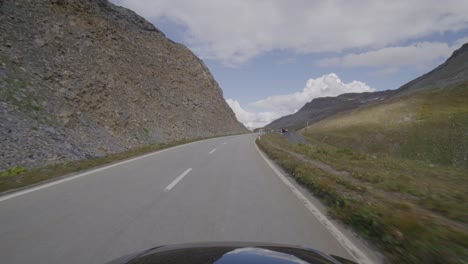 Driving-from-the-Grimsel-to-the-Furka-pass-through-the-famous-valley-in-the-swiss-alps