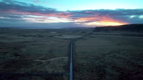 Aerial-Panoramic-View-Of-An-Endless-Highway-In-Olfus-During-Sunset-In-South-Iceland