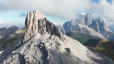 Aerial-of-stunning-Becco-Di-Mezzodi-mountain,-Monte-Pelmo-in-background