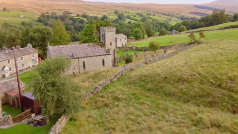 Drone-aerial-reveal-shot-of-church-in-Yorkshire-Dales