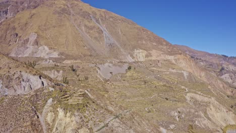 Maca-district-aerial-shot,-Peña-Blanca-tunnel,-Colca-Valley-route