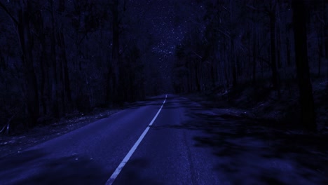 Rear-facing-night-driving-point-of-view-POV-for-interior-car-scene-green-screen-replacement---night-time-footage-under-a-clear-starry-sky,-on-quiet-long-straight-deserted-country-road