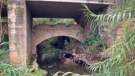 Creek-Under-a-Bridge-in-l'Eliana,-Valencia,-Spain
