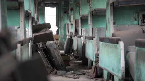 Rows-of-empty-seat-inside-an-old-abandoned-train