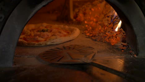 Pizza-baking-in-wooden-oven-part-3-from-3-4K