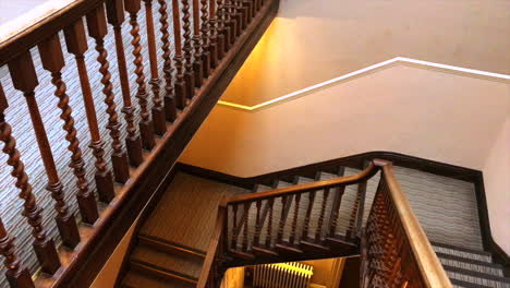 Leicestershire-Manor-House-Staircase-looking-down-two-flights-of-stairs-side-angle