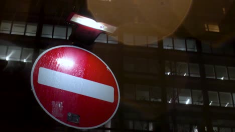 No-entry-traffic-sign-during-rainy-night