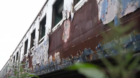 Old-rusty-abandoned-train-sitting-in-the-graveyard