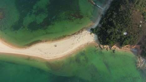 Pak-Sha-Chau-island-at-Hong-Kong-bay,-with-a-strip-of-sand-connecting-to-a-small-island,-Aerial-view