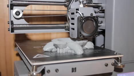 Level-shot-of-an-FDM-3D-printer-creating-an-object-with-hot-plastic
