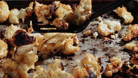 Scooping-up-cauliflower-with-a-spatula