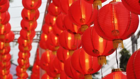 Rows-Of-Hanging-Red-Lanterns-For-Chinese-New-Year,-CLOSE-UP