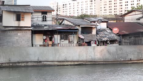 Ghetto-Housing-Estate-On-The-Banks-Of-A-River-In-Downtown-Bangkok