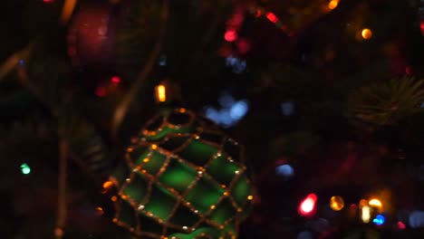 Deep-focus-on-sparkling-tree-with-ornaments