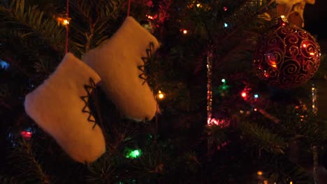 Deep-focus-on-sparkling-tree-and-skate-ornament