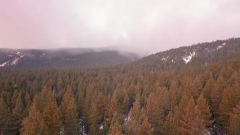 Drone-shot-of-morning-clouds-in-the-mountains-of-lake-tahoe