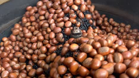 Slow-motion-of-roasting-chestnuts